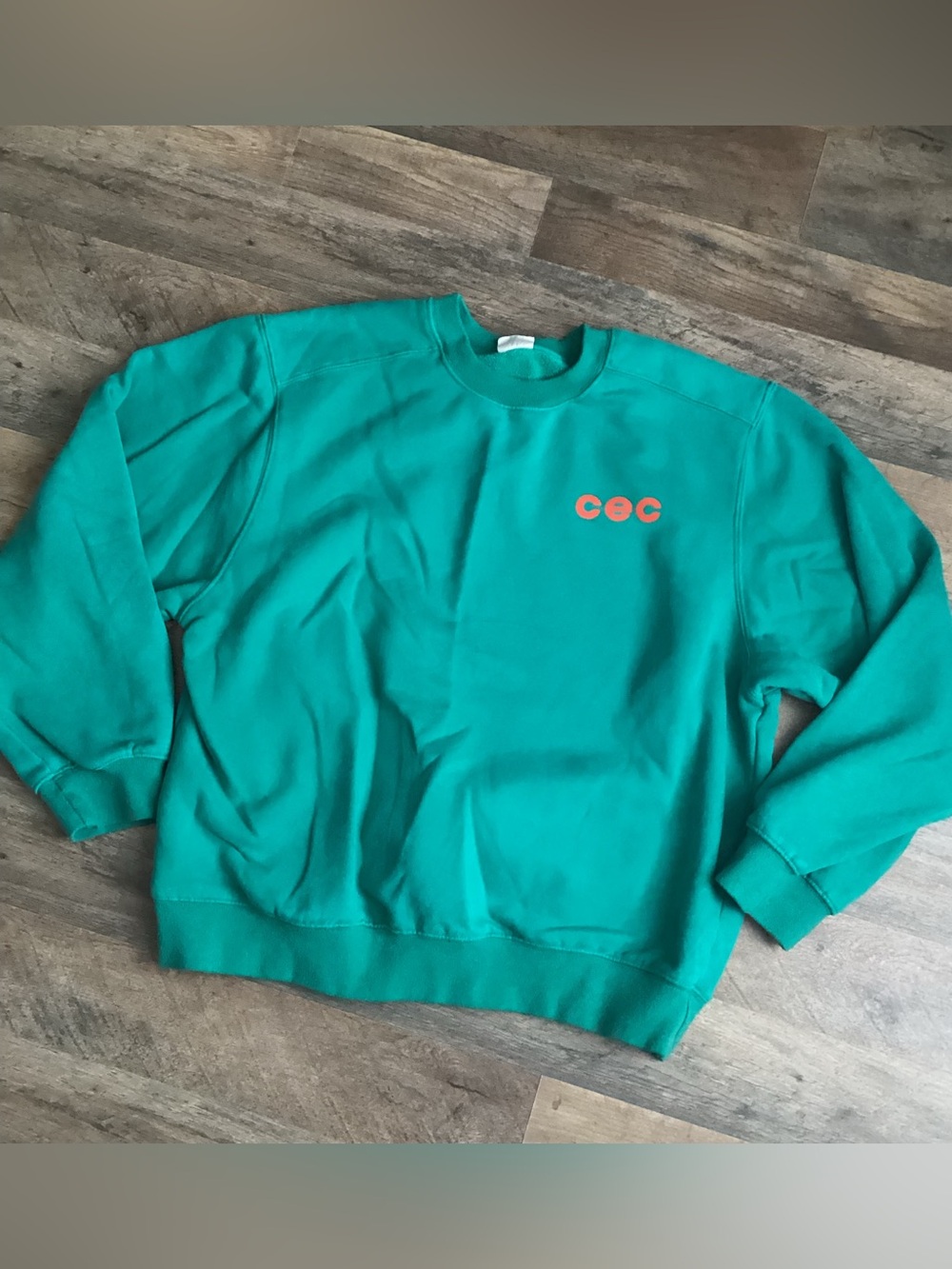 Chance Teal Crewneck Sweatshirt with Orange Chest Logo